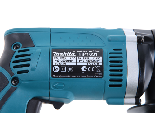 Ударная дрель Makita HP1631 в коробке